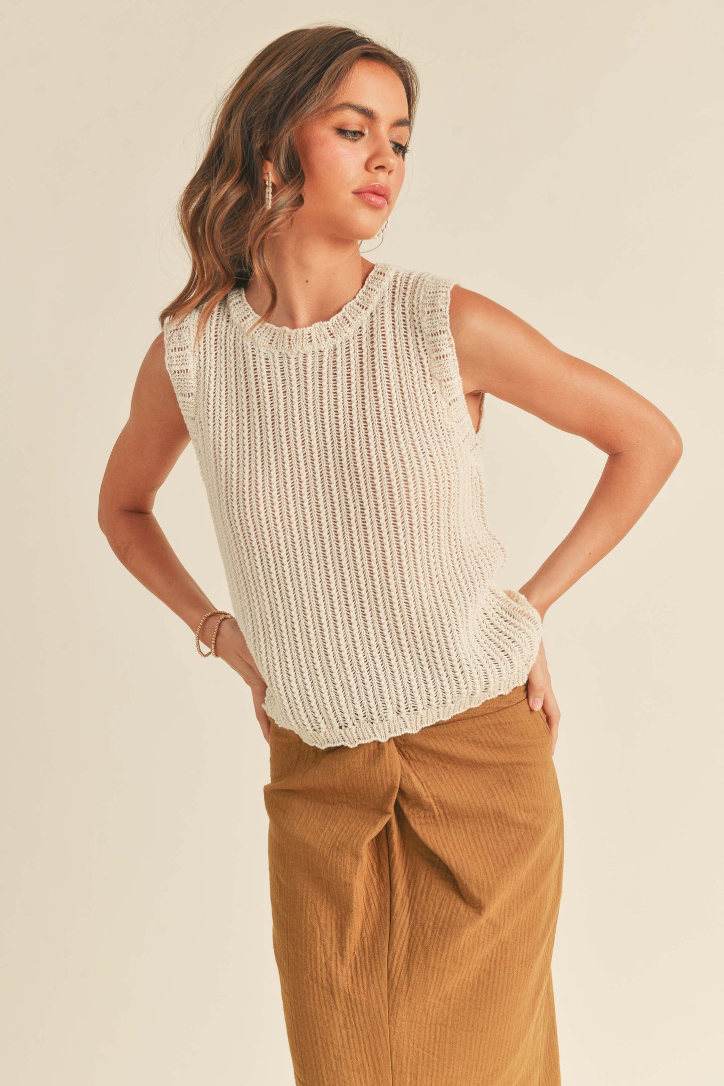 T1883   SLEEVELESS KNITTED TOP: S / IVORY $48.00