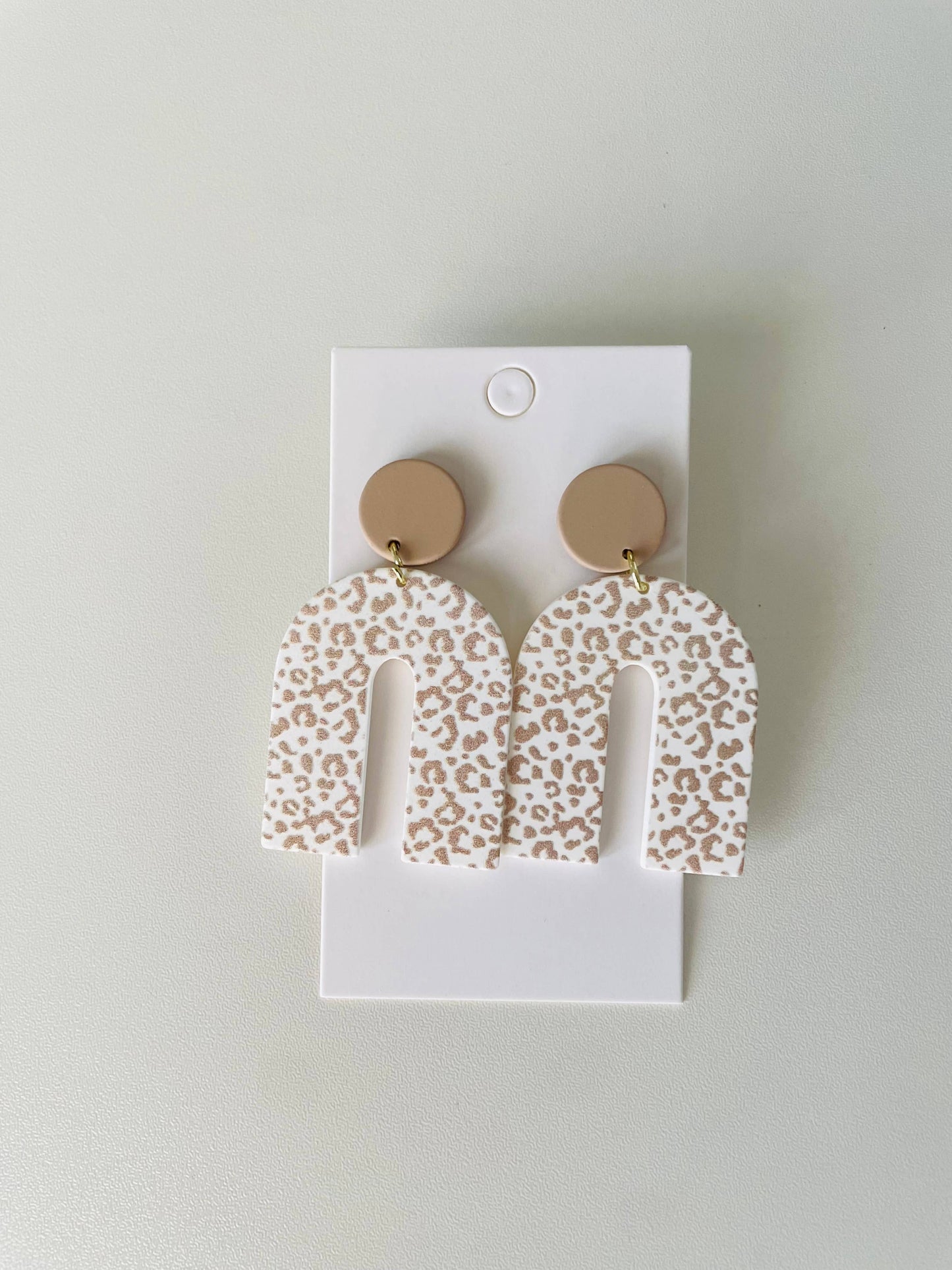 The Wildflower Company - Tan Leopard Arch Earrings